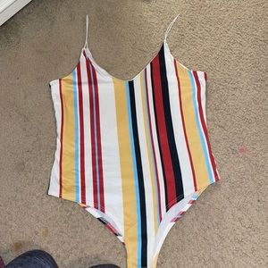 Womens striped bodysuit, brand new condition.